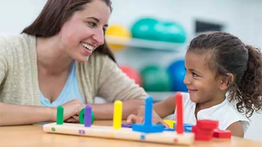 Occupational Therapist with Young Girl