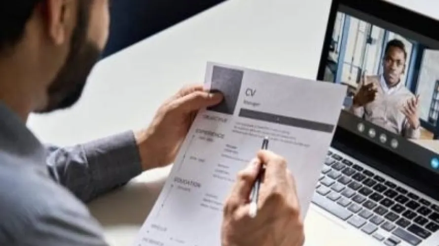 man holding resume