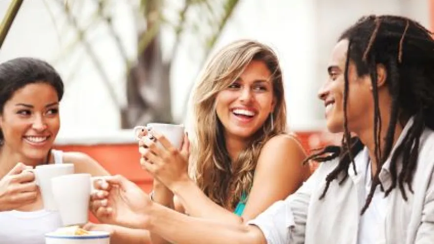 Three people conversing