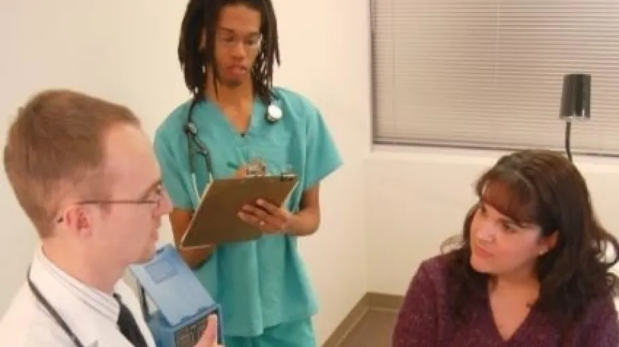 Woman being consulted by doctor