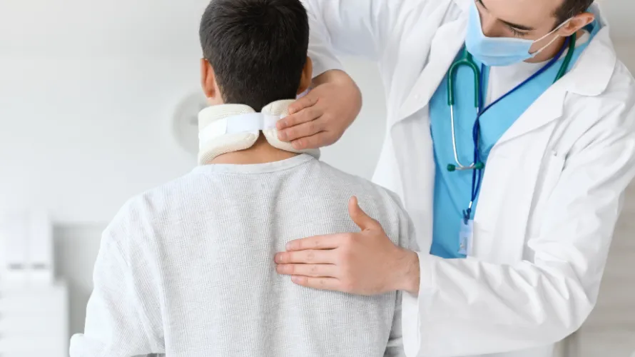 Doctor Treating SCI Patient