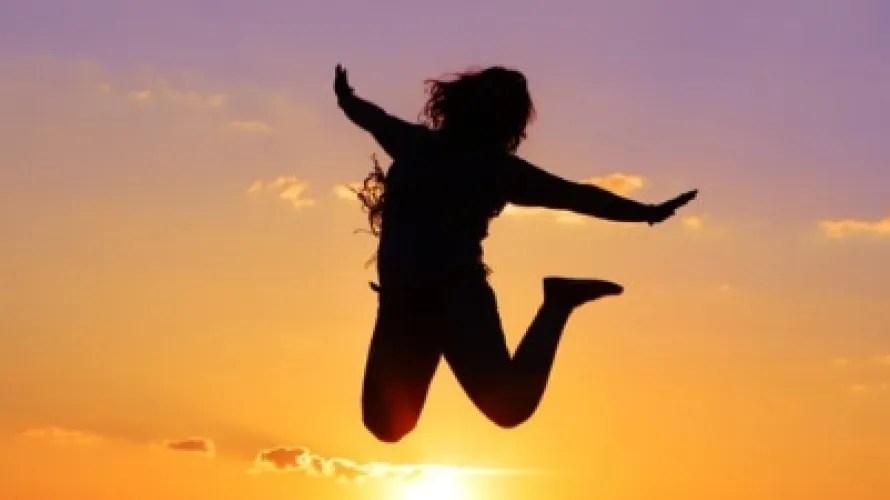 person jumping into air